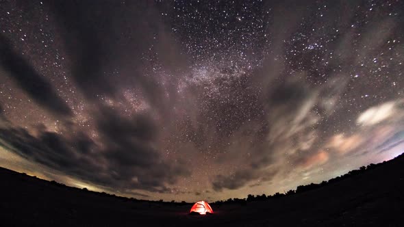 Camping on Deserted Beach Under Stars and Milky Way alt