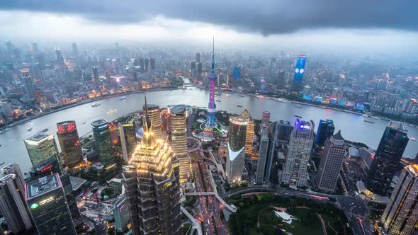 Timelapse of city skyline from day to night in Shanghai china alt