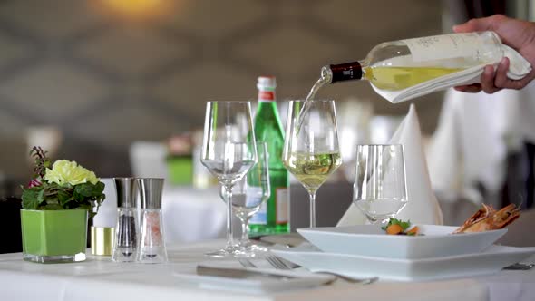 White Wine Poured in Restaurant