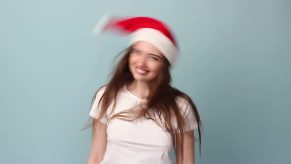 Young Beautiful Woman European Appearance White Tshirt Wagging Fooling Around with Her Head with alt