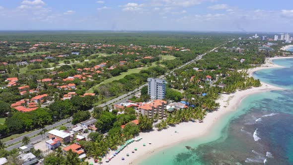 Aerial of idyllic coastline of Playa Juan Dolio with offshore reef alt
