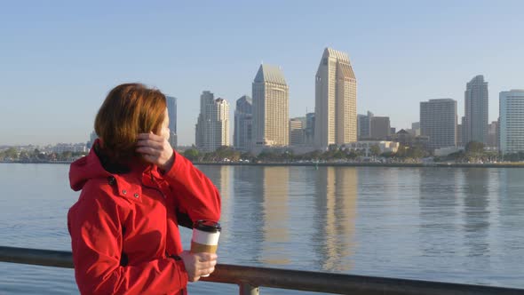Woman Drinking Coffe at Morning on San Diego City