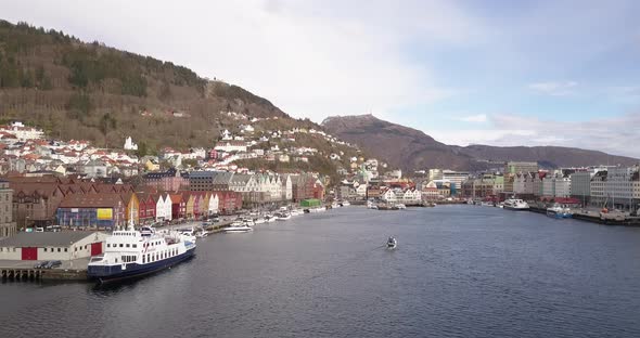 Bergen Port   Moving Forward Following A Small Boat