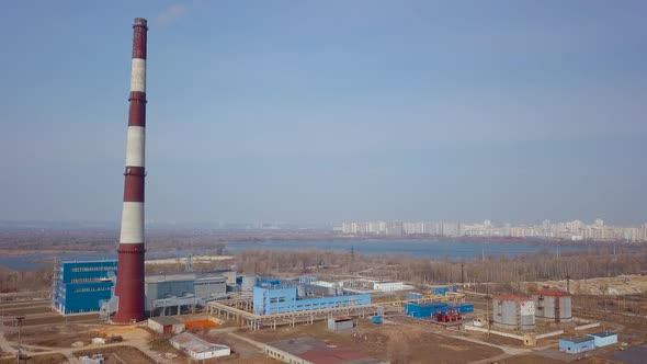 Pipes Factory Towering Above the Town