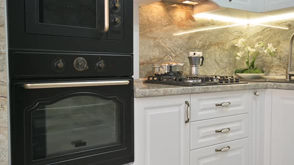 Closeup Tilt Camera Movement at Modern Classic White Kitchen Interior alt