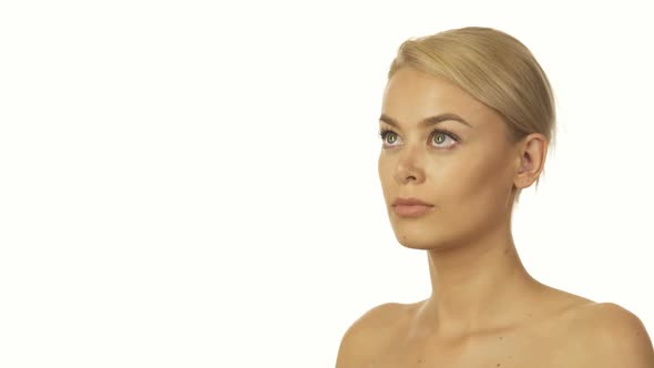 The Thoughtful Girl Raises His Gaze Up and Smiling alt