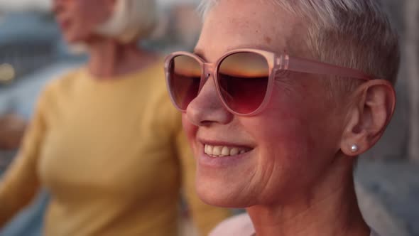 Middle-aged Woman in Sunglasses alt