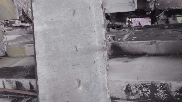 Vertical Video of a Multistorey Building Destroyed During the War in Ukraine alt