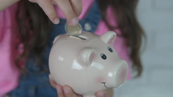 Put into a piggy bank.  alt