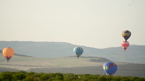 Beautiful Rocky Landscape of Crimea with Colorful Hotair Balloons Balloons Flying on Sunset HDR Time alt