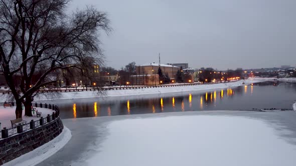 Evening flying on winter river in Kharkiv city