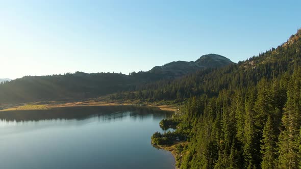 Aerial View of Beautiful Glacier Lake in the Canadian Mountain Landscape alt