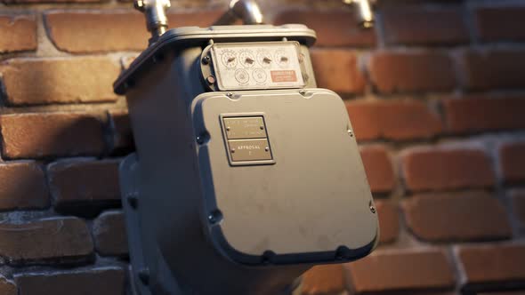 Gas meter showing fuel flow in a timelapse. Camera zooms into a closeup. 4KHD