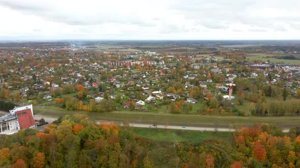 Aerial View of the Bobsleigh and Skeleton Track Luge Track Sigulda Surrounded by Colorful Forests 4K alt