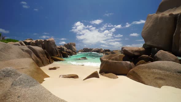 Beach and Ocean Between Rocks alt