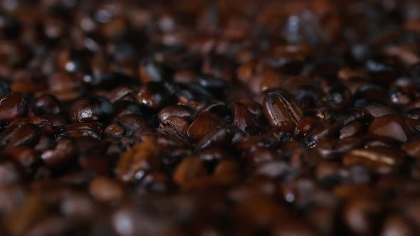 Close-up, Dark Coffee Beans Are Roasted. Freshly Roasted Aromatic Coffee, Coffee Grains.