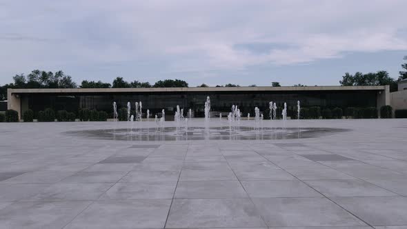 Wide Moving Ground Frame. Wonderful Fountain in the Middle of a Stone Area. alt