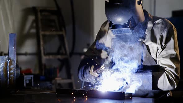 Welder Welding a Metal alt