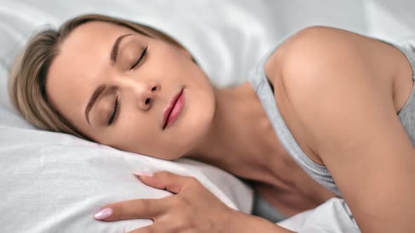 Face Adorable Young Blonde Woman Smiling Enjoying Night Resting Sleeping in Comfy Cotton Bed
