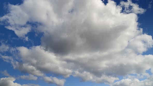 Clouds on a Blue Spring Sky alt