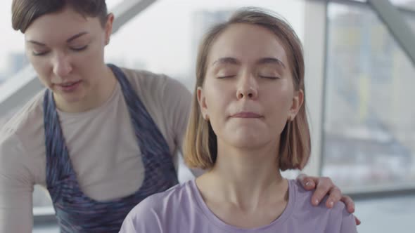 Blond Woman With Personal Trainer alt