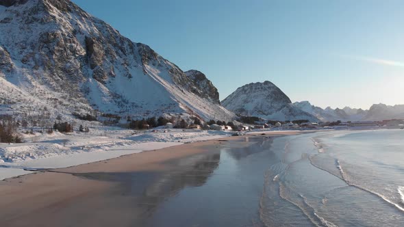 Ramberg beach during winter covered by snow in the Lofoten islands. 