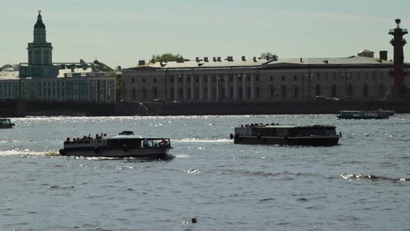 boats on the water ride tourists in the historic city, St. Petersburg alt