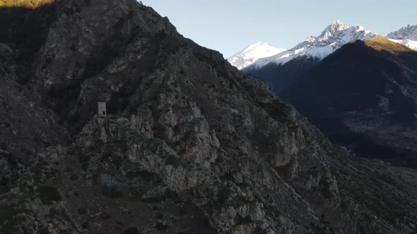 Ruins of a fortress high in the mountains from a bird's eye view. Mountain landscape