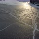 Frozen Lake High Up Drone View In Winter With Snow Trails - VideoHive Item for Sale