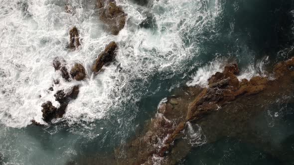 Ocean Waves Breaking on Volcanic Rocks alt