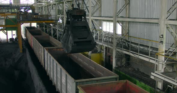 Loading of Iron Ore at a Mining Plant alt