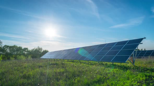 Solar panels and sun, panoramic time-lapse alt
