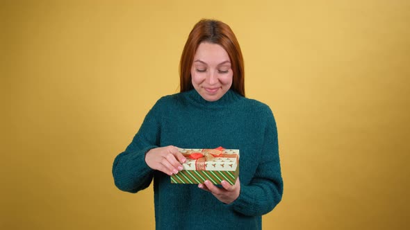 Young Red Hair Woman Posing Isolated on Yellow Color Background Studio alt