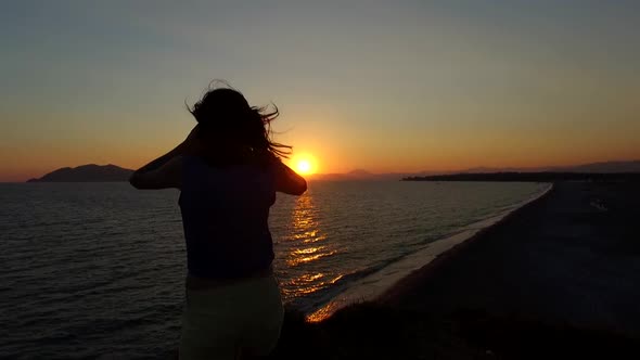 Woman Watching The Sunset alt