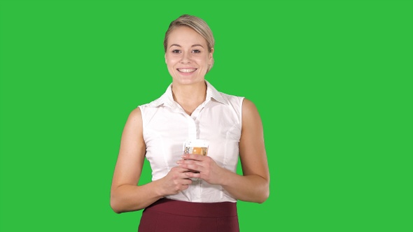 Attractive Young Woman Counts Money What to Spend It On alt