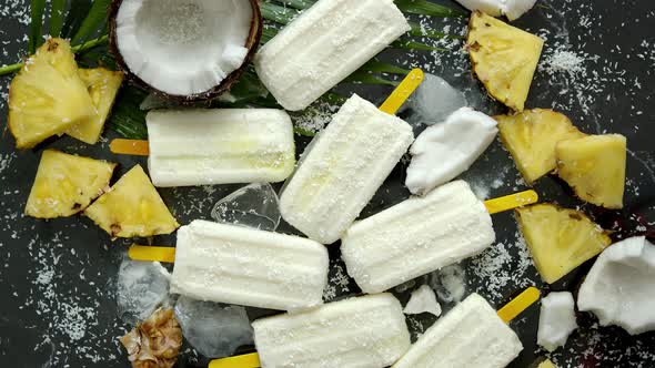 Summer Popsicles on Stick. Pinacolada Flavour. Made with Pineapple, Cocount Milk, Rum. Vegan Snack alt