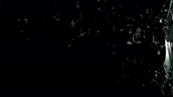 Real Glass Side Break in Super Slow Motion Isolated on Black Background, 1000Fps. alt