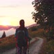Hiker On Trek In Mountains On Sunset - VideoHive Item for Sale