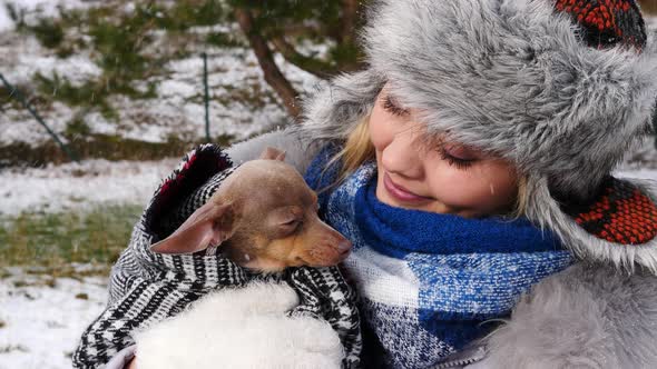 Girl Hug her Dog, Cold Winter Day