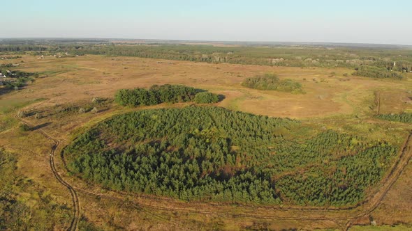  Aerial View of the Countryside and Small Village with Green Fields and Meadows alt