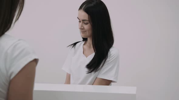 Greet Consult with Patient on the Clinic Reception alt