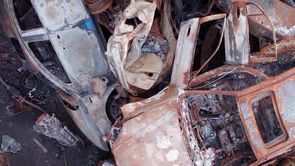 Vertical Video Irpin Bucha District  Destroyed Cars During the War in Ukraine alt