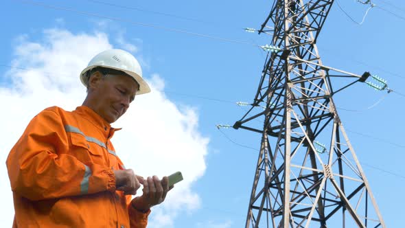 Explorer Types on Smartphone Under Blue Sky with Cloud alt