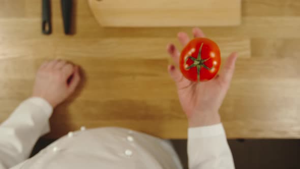 Cook Throws Up Tomato And Catches It