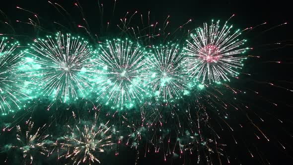 Long Time Seamless Loop of Real Colourful Fireworks Festival in Sky Display at Night During National alt