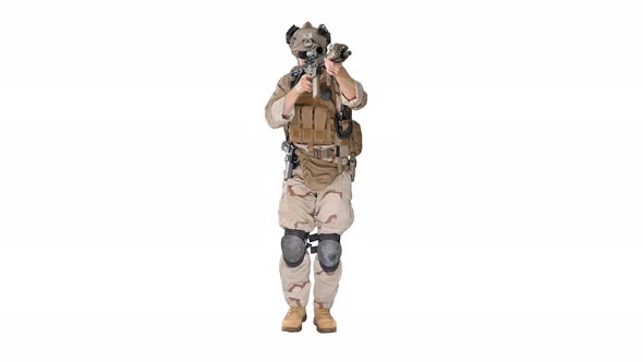 Soldier of Special Force Walking and Shooting with a Rifle on White Background. alt