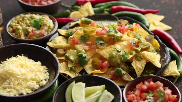 Fresh Yellow Corn Nacho Chips on Ceramic Plate alt