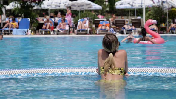 Bikini Girl in Swimming Pool