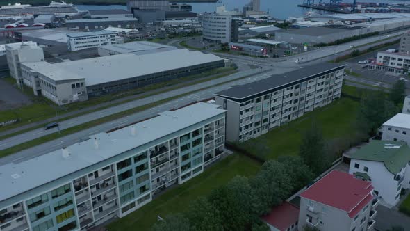 High Angle Shot of Low Traffic on Multilane Road Between Multistorey Apartment Buildings and alt