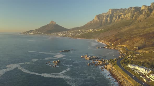Scenic wide aerial Drone view of coastal Oudekraal Nature Reserve, Twelve apostles mountains, South alt